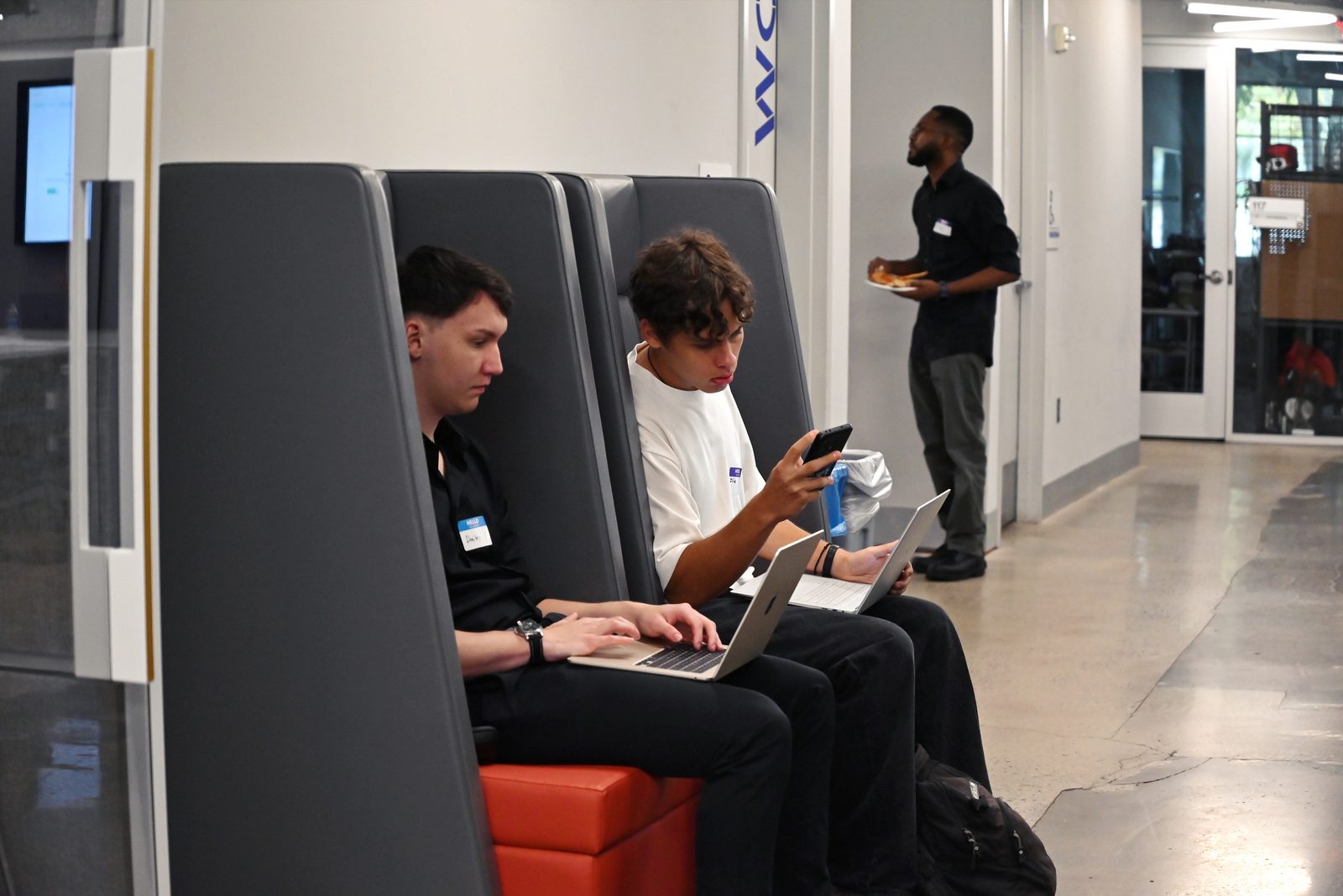 Two participants coding side by side